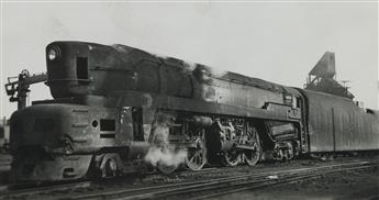 (TRAINS--PENNSYLVANIA RAILROAD) A binder assembled by the artist Lewis Smith with approximately 280 snapshots of steam locomotives.